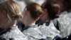 Femmes militaires assistant à la célébration par l'armée américaine du Mois de la sensibilisation et de la prévention des agressions sexuelles, au Pentagone à Arlington, en Virginie, le 31 mars 2015. (Chip Somodevilla/AFP)