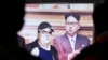 A TV screen shows pictures of North Korean leader Kim Jong Un and his older brother Kim Jong Nam, left, at the Seoul Railway Station in Seoul, South Korea, Feb. 14, 2017