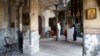 Russian Orthodox visitors take souvenir pictures following services at St. Elijah Church, Istanbul, Aug. 2, 2013.
