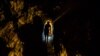 FILE - A man walks in a tunnel at a gold mine in El Callao, Bolivar state, Venezuela, March 1, 2017.