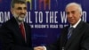 FILE - Kurdistan Regional Government Natural Resources Minister Ashti Hawrami, right, shakes hands with Turkey's Energy Minister Taner Yildiz, Irbil, Iraq, May 2012.