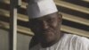 Maj. Hamza Al-Mustapha leaves the court after a verdict in Lagos, Nigeria, on Monday, Jan. 30, 2012.