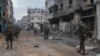 This handout picture released by the Israeli army on November 16, 2023, shows troops during a military operation in the northern Gaza Strip amid continuing battles between Israel and the Palestinian militant group Hamas.