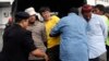 2011 FILE: Police detain opposition Parti Keadilan Rakyat (PKR) MP Tian Chua (3rd L in yellow) and supporters of the "Bersih" (Clean) electoral reform coalition during a rally in Kuala Lumpur, Malaysia.