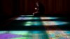 A Crimean Tatar man prays at a mosque in Bakhchysarai, Ukraine, March 10, 2014.
