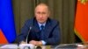 Russian President Vladimir Putin heads a meeting with senior military officials at the Black Sea resort of Sochi, Russia, Nov. 16, 2016. 