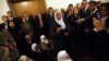 Pro-Kurdish demonstrators calling themselves 'Peace Mothers' (C) hold a sit-in protest against air strikes on the Iraqi border that killed 34 Turkish Kurd smugglers, in front of the office of Turkish Prime Minister Tayyip Erdogan at the parliament in Anka