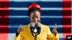 American poet Amanda Gorman reads one of her poems during the 59th Presidential Inauguration at the US Capitol in Washington, Jan. 20, 2021.