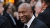 John Singleton, director de Boyz n the Hood, llega a la 80a ceremonia de entrega de los Oscar, el 24 de febrero de 2008.
