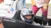 PS Racing车队的王日升戴着国际儿童慈善基金的标志参加珠海车赛（2013年9月15日）
