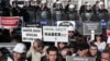 Turkish journalists demonstrate outside the governor's office to protest censorship and new regulations on media freedoms and Internet bans in Istanbul, Feb. 16, 2014.