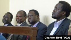 Former SPLM secretary-general Pagan Amum (second from left) testified in his own defense in a court in Juba on Friday, April 11.