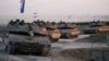 Tank Israel menuju perbatasan Jalur Gaza di Israel selatan pada Kamis, 12 Oktober 2023. (Foto: AP)