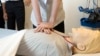 FILE - CPR is demonstrated during a tour of Addenbrooke's Hospital in Cambridge, England, June 30, 2023. Researchers have found that bystanders are less likely to administer potentially life-saving CPR to women than men.