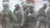 "Зеленые человечки" - российские военнослужащие - участники вторжения в Крым в феврале 2014 г. Архивное фото.