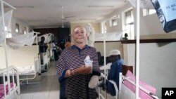 FILE - Said Abdallah lost his left hand in a April 10, 2010 attack.