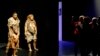 FILE - Visitors take pictures of models representing Flores, human and Neanderthal women in the "Musee des Confluences," a new science and anthropology museum in Lyon, central France, Dec. 18, 2014. 