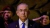ILE PHOTO: Israeli Prime Minister Benjamin Netanyahu attends a wreath-laying ceremony marking Holocaust Remembrance Day in Jerusalem
