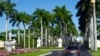 FILE - The motorcade with President Donald Trump, drives into the Trump International Golf Club in West Palm Beach, Florida, Nov. 21, 2018. 