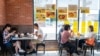 People eat at the Red Chicken Thai restaurant as Los Angeles County moves into life up restrictive coronavirus disease (COVID-19) disease reopening tier, in San Gabriel Valley, California, U.S., June 15, 2021
