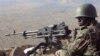 FILE - A Cameroonian soldier guards an observation post on a hill in the Mandara Mountain chain in Mabass overlooking Nigeria, northern Cameroon, Feb. 16, 2015. 