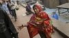 An Indian girl reaches out for a passer-by as she begs for change near the Jama Masjid during the holiday of Eid al-Adha in New Delhi, India, October 27, 2012.