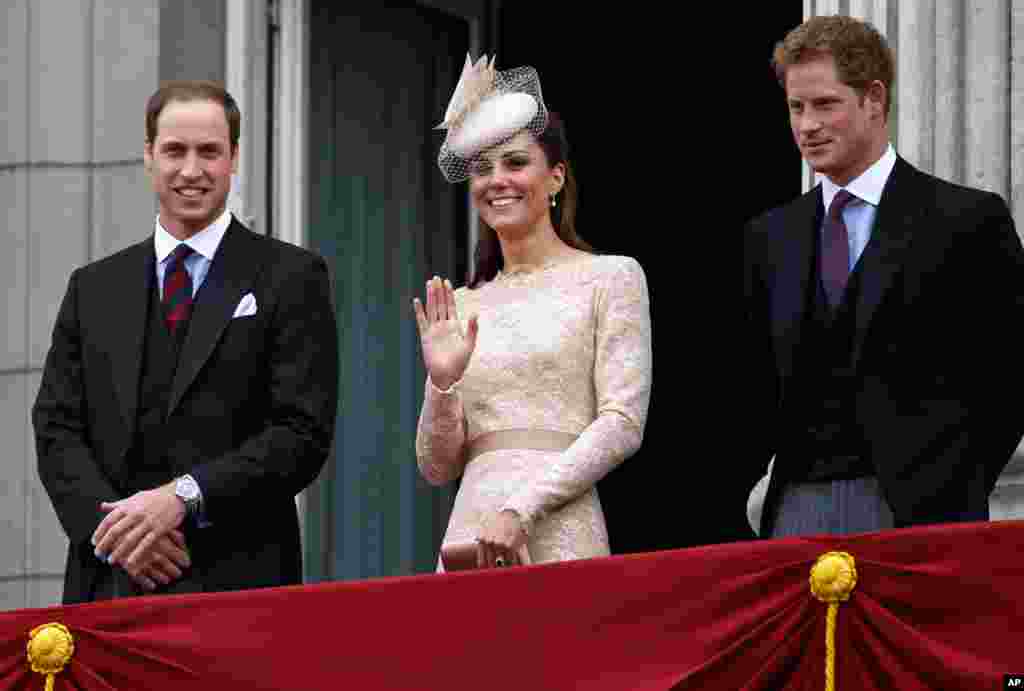 Britain's Prince Willam, his wife Kate, and Prince Harry stand on the balcony at Buckingham Palace during the Diamond Jubilee celebrations.