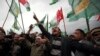 Supporters of different opposition political parties shout slogans for the empowerment of the Election Commission of Pakistan during a rally in Islamabad February 4, 2013. REUTERS/Mian Khursheed (PAKISTAN - Tags: CIVIL UNREST POLITICS) - RTR3DCBL